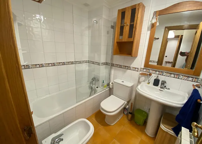 En Chanclas A La Playa Luanco